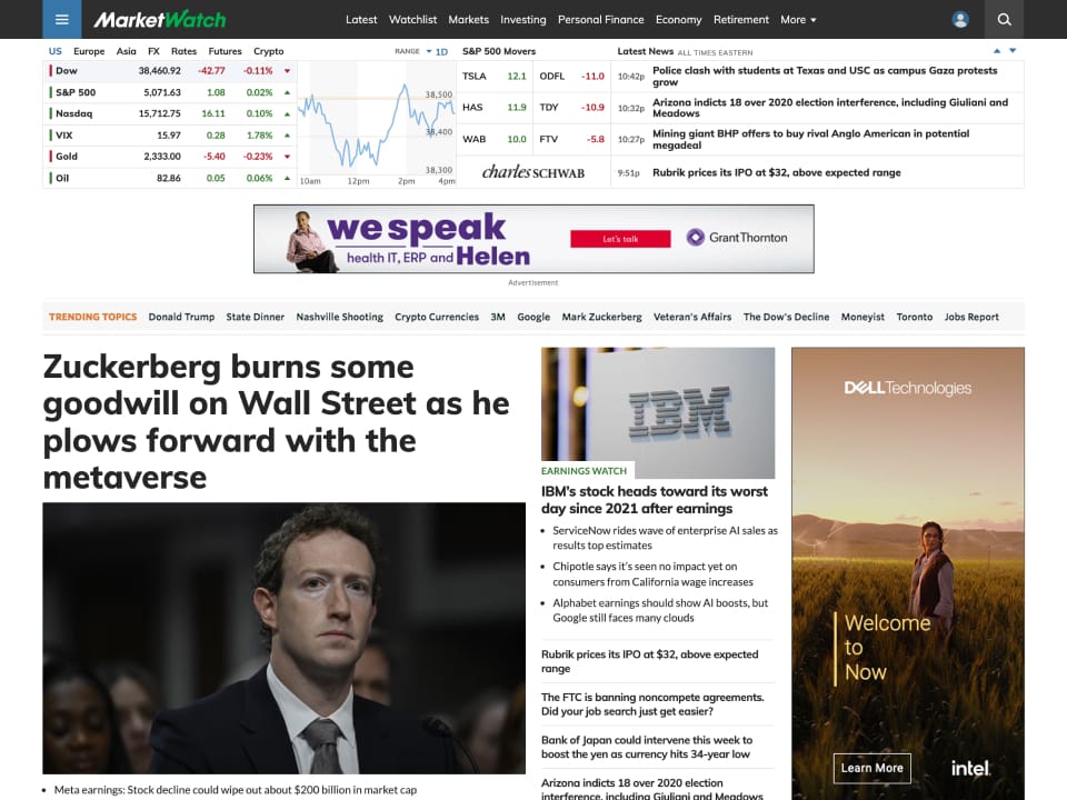 A media website with financial data and charts in the masthead and articles with images organized in a grid below. 